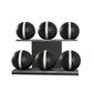 Six black leather medicine balls with white accent leather, arranged on two shelves made of black ash wood. PENT. MOXA Set Ultimate - Set of 6 Medicine Balls on Horizontal Wooden Stand