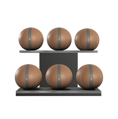 Six brown leather medicine balls with grey accent leather, arranged on two shelves made of black ash wood. PENT. MOXA Set Ultimate - Set of 6 Medicine Balls on Horizontal Wooden Stand
