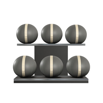 Six grey leather medicine balls with white accent leather, arranged on two shelves made of black ash wood. PENT. MOXA Set Ultimate - Set of 6 Medicine Balls on Horizontal Wooden Stand