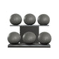 Six grey leather medicine balls with grey accent leather, arranged on two shelves made of black ash wood. PENT. MOXA Set Ultimate - Set of 6 Medicine Balls on Horizontal Wooden Stand