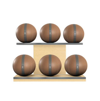 Six brown leather medicine balls with grey accent leather, arranged on two shelves made of natural ash wood. PENT. MOXA Set Ultimate - Set of 6 Medicine Balls on Horizontal Wooden Stand