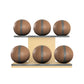 Six brown leather medicine balls with grey accent leather, arranged on two shelves made of natural ash wood. PENT. MOXA Set Ultimate - Set of 6 Medicine Balls on Horizontal Wooden Stand