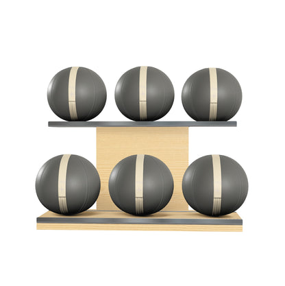 Six grey leather medicine balls with beige accent leather, arranged on two shelves made of natural ash wood. PENT. MOXA Set Ultimate - Set of 6 Medicine Balls on Horizontal Wooden Stand
