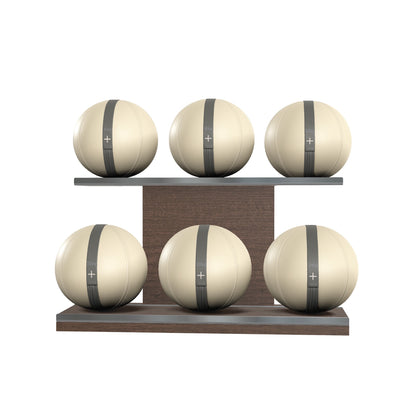 Six beige leather medicine balls with grey accent leather, arranged on two shelves made of natural walnut wood. PENT. MOXA Set Ultimate - Set of 6 Medicine Balls on Horizontal Wooden Stand