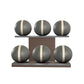Six grey leather medicine balls with white accent leather, arranged on two shelves made of natural walnut wood. PENT. MOXA Set Ultimate - Set of 6 Medicine Balls on Horizontal Wooden Stand