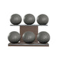 Six grey leather medicine balls with grey accent leather, arranged on two shelves made of natural walnut wood. PENT. MOXA Set Ultimate - Set of 6 Medicine Balls on Horizontal Wooden Stand