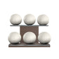 Six white leather medicine balls with white accent leather, arranged on two shelves made of natural walnut wood. PENT. MOXA Set Ultimate - Set of 6 Medicine Balls on Horizontal Wooden Stand