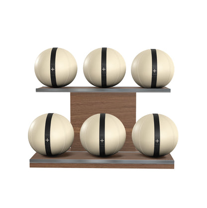 Six beige leather medicine balls with black accent leather, arranged on two shelves made of natural walnut wood. PENT. MOXA Set Ultimate - Set of 6 Medicine Balls on Horizontal Wooden Stand