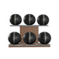 Six black leather medicine balls with grey accent leather, arranged on two shelves made of natural walnut wood. PENT. MOXA Set Ultimate - Set of 6 Medicine Balls on Horizontal Wooden Stand
