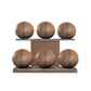 Six brown leather medicine balls with grey accent leather, arranged on two shelves made of natural walnut wood. PENT. MOXA Set Ultimate - Set of 6 Medicine Balls on Horizontal Wooden Stand