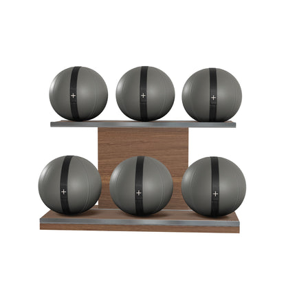 Six grey leather medicine balls with black accent leather, arranged on two shelves made of natural walnut wood. PENT. MOXA Set Ultimate - Set of 6 Medicine Balls on Horizontal Wooden Stand