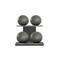 Four black leather medicine balls with grey accent leather, arranged on two shelves made of black ash wood. PENT. MOXA Power - Set of 4 Medicine Balls on Horizontal Wooden Stand