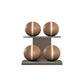 Four brown leather medicine balls with beige accent leather, arranged on two shelves made of natural wood. PENT. MOXA Power - Set of 4 Medicine Balls on Horizontal Wooden Stand