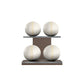 Four white leather medicine balls with beige accent leather, arranged on two shelves made of natural walnut wood. PENT. MOXA Power - Set of 4 Medicine Balls on Horizontal Wooden Stand