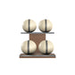 Four beige leather medicine balls with grey accent leather, arranged on two shelves made of natural walnut wood. PENT. MOXA Power - Set of 4 Medicine Balls on Horizontal Wooden Stand