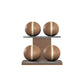 Four brown leather medicine balls with beige accent leather, arranged on two shelves made of natural walnut wood. PENT. MOXA Power - Set of 4 Medicine Balls on Horizontal Wooden Stand