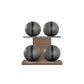 Four grey leather medicine balls with black accent leather, arranged on two shelves made of natural walnut wood. PENT. MOXA Power - Set of 4 Medicine Balls on Horizontal Wooden Stand