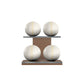 Four white base leather medicine balls with beige accent leather, arranged on two shelves made of natural walnut wood. PENT. MOXA Power - Set of 4 Medicine Balls on Horizontal Wooden Stand