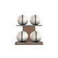 Four white leather medicine balls with grey accent leather, arranged on two shelves made of natural walnut wood. PENT. MOXA Power - Set of 4 Medicine Balls on Horizontal Wooden Stand