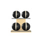 Four black leather medicine balls with beige accent leather, arranged on two shelves made of natural ash wood. PENT. MOXA Power - Set of 4 Medicine Balls on Horizontal Wooden Stand