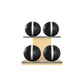 Four black leather medicine balls with white accent leather, arranged on two shelves made of natural ash wood. PENT. MOXA Power - Set of 4 Medicine Balls on Horizontal Wooden Stand