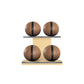 Four brown leather medicine balls with black accent leather, arranged on two shelves made of natural ash wood. PENT. MOXA Power - Set of 4 Medicine Balls on Horizontal Wooden Stand
