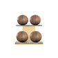 Four brown leather medicine balls with grey accent leather, arranged on two shelves made of natural ash wood. PENT. MOXA Power - Set of 4 Medicine Balls on Horizontal Wooden Stand