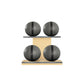Four grey leather medicine balls with black accent leather, arranged on two shelves made of natural ash wood. PENT. MOXA Power - Set of 4 Medicine Balls on Horizontal Wooden Stand