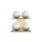 Four white leather medicine balls with white accent leather, arranged on two shelves made of natural ash wood. PENT. MOXA Power - Set of 4 Medicine Balls on Horizontal Wooden Stand
