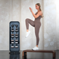 User performing a step workout on the NOHRD StepTower, demonstrating fluid motion and ergonomic stance.