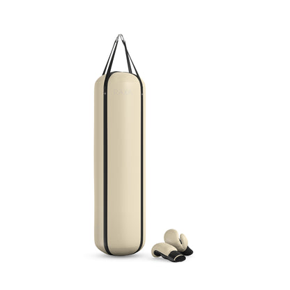 Luxury boxing equipment, handcrafted genuine Italian leather punching bag and boxing gloves, filled with genuine leather scraps. Base leather in beige and accent leather in black color. PENT. RAXA