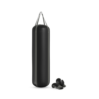 Luxury boxing equipment, handcrafted genuine Italian leather punching bag and boxing gloves, filled with genuine leather scraps. Base leather in black and accent leather in black color. PENT. RAXA