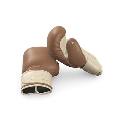 Luxury fitness equipment, handmade boxing gloves with premium Italian leather, base leather in brown and accent leather in beige color. PENT. RAXA - Luxury Boxing Gloves