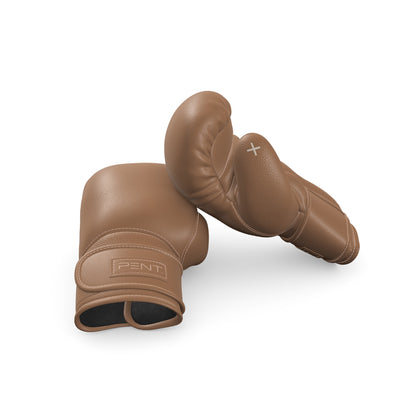 Luxury fitness equipment, handmade boxing gloves with premium Italian leather, both base & accent leather in brown color. PENT. RAXA - Luxury Boxing Gloves