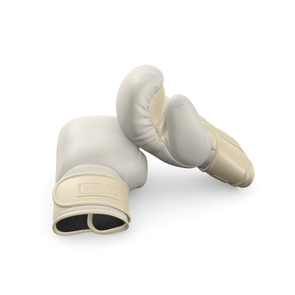 Luxury fitness equipment, handmade boxing gloves with premium Italian leather, base leather in white and accent leather in beige color.  PENT. RAXA - Luxury Boxing Gloves