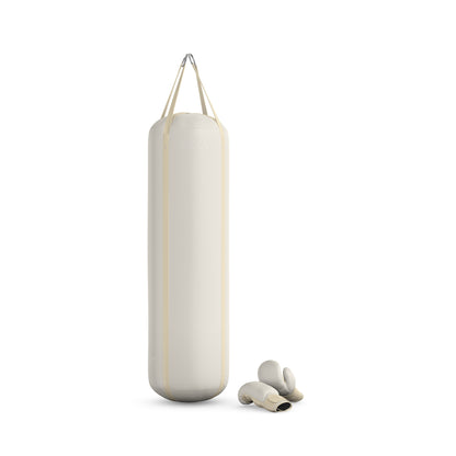 Luxury boxing equipment, handcrafted genuine Italian leather punching bag and boxing gloves, filled with genuine leather scraps. Base leather in white and accent leather in beige color. PENT. RAXA 