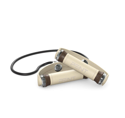Luxury gym equipment, handcrafted resistance band with dark walnut wood and premium beige leather. PENT. RESA - Luxury Fitness Resistance Band