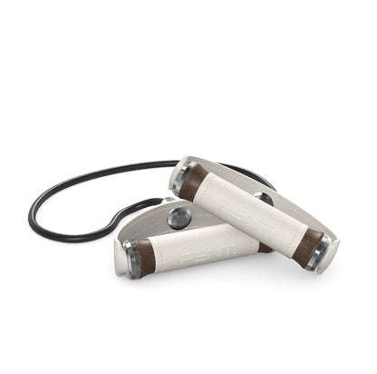 Luxury gym equipment, handcrafted resistance band with dark walnut wood and premium white leather. PENT. RESA - Luxury Fitness Resistance Band