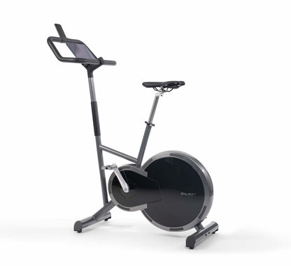 A stylish modern exercise bike with a sleek design in black colour, black wood panel, featuring three adjustable grip positions and a multifunctional console. Stil-Fit Ergometer Pure - Stationary Bike
