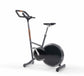 A stylish modern exercise bike with a sleek design in black colour, walnut wood panel, featuring three adjustable grip positions and a multifunctional console. Stil-Fit Ergometer Pure - Stationary Bike