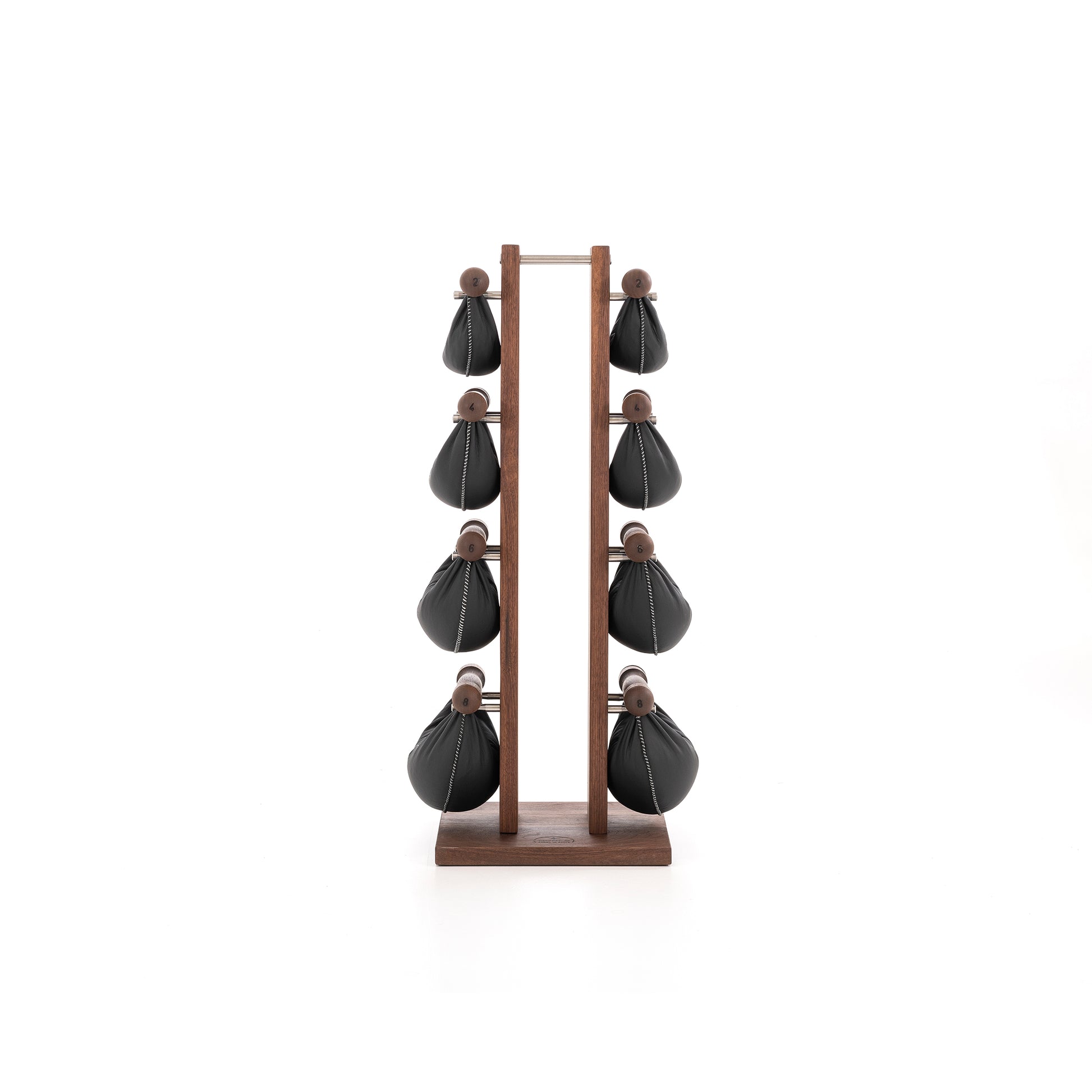 Front view of six wooden swingbell with black leather, neatly arranged on a wooden rack, highlighting craftsmanship and simplicity in design. NOHRD Swing Tower - Leather Dumbbell Set