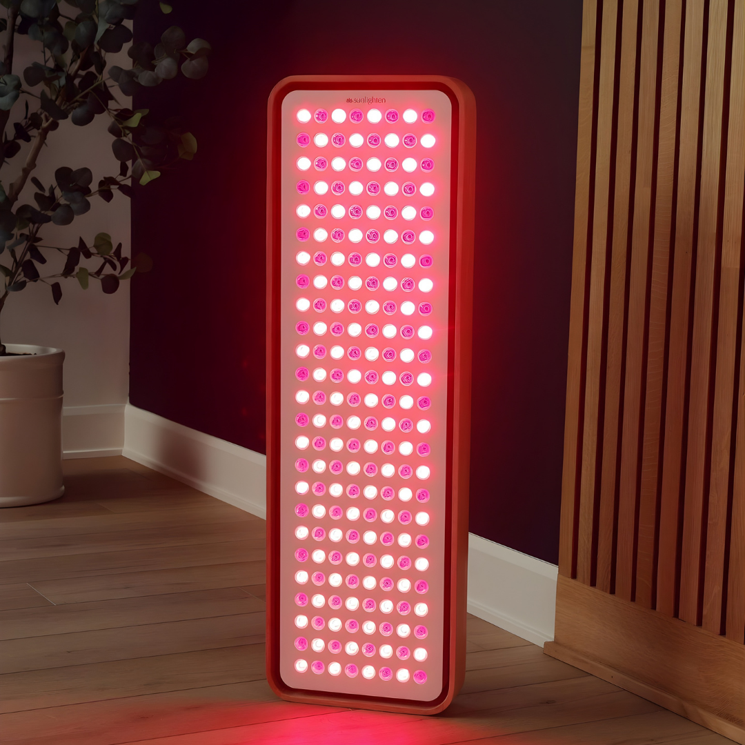 Sunlighten Red Light Therapy Panel standing upright with visible LED grid.
