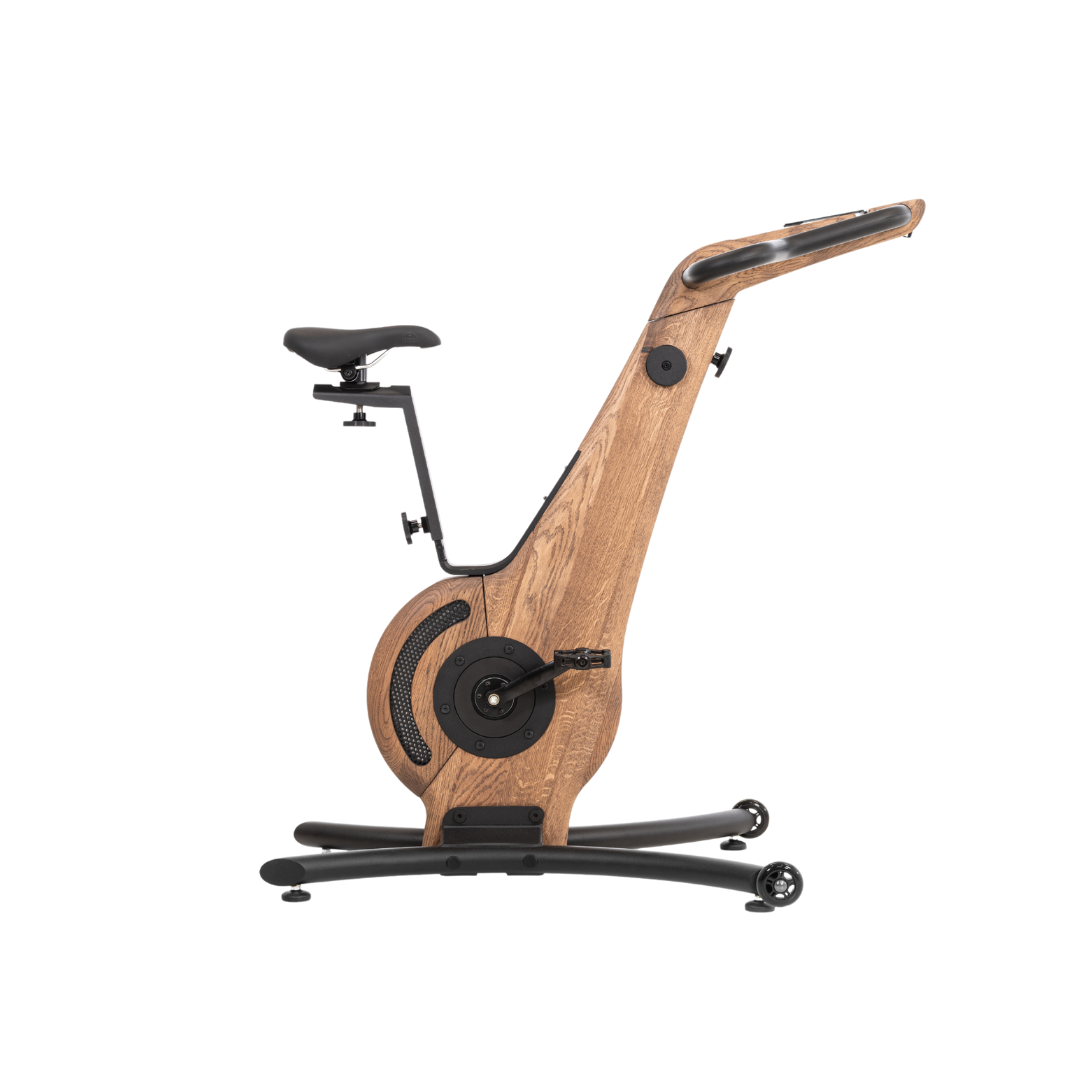 A modern exercise bike with vintage wooden frame and minimalist design, featuring an adjustable seat and streamlined structure. NOHRD Bike V2