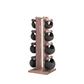 Six black leather swingbell are neatly arranged on a vintage wooden rack, highlighting craftsmanship and simplicity in design. NOHRD Swing Tower - Leather Dumbbell Set