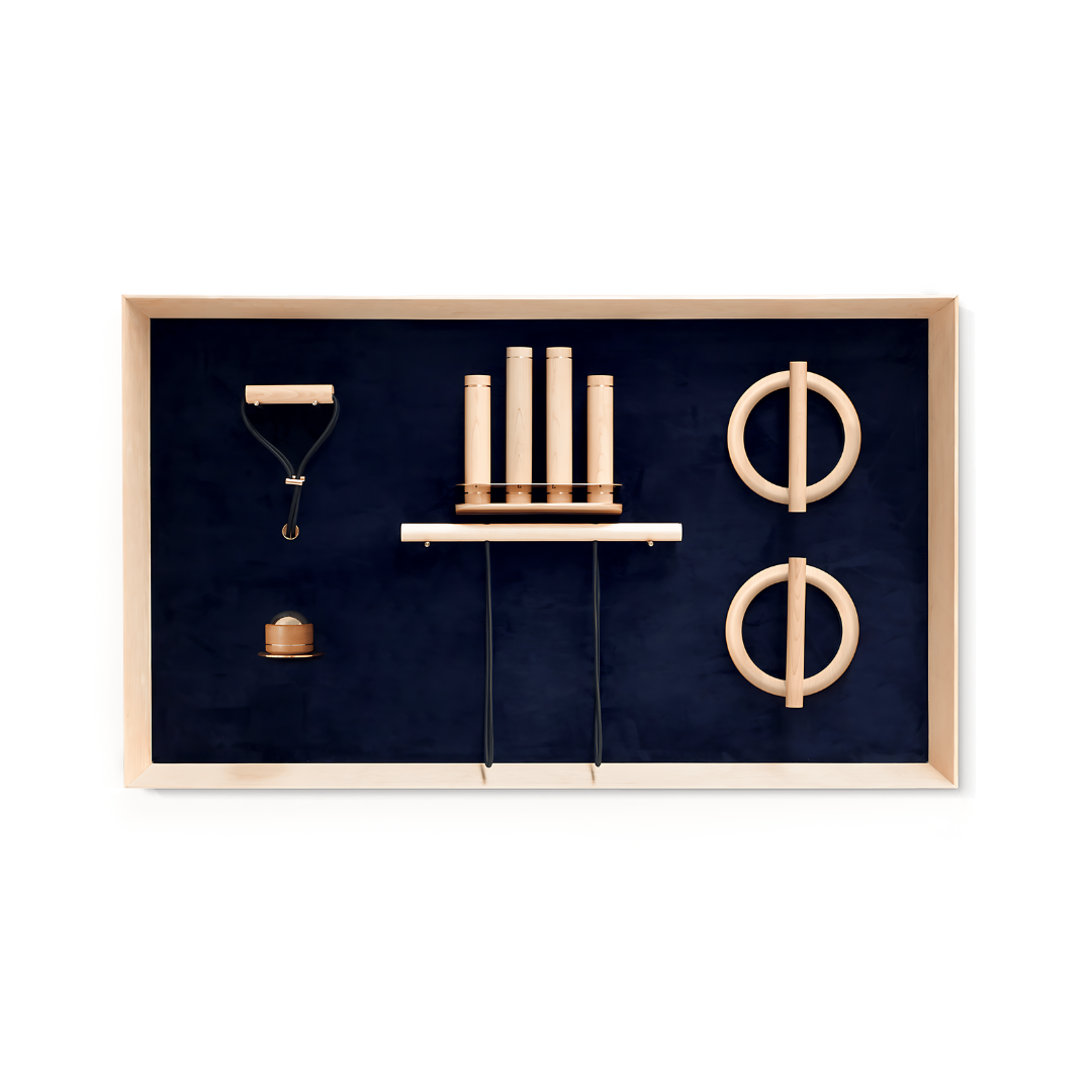 Kenko Wall Set “L” – sculptural wall-mounted fitness set in maple with brass accents.