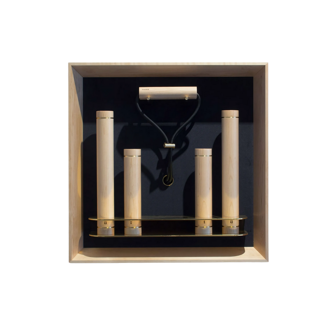 Kenko Wall Set “M” – minimalist wall-mounted fitness kit in maple wood with brass accents.