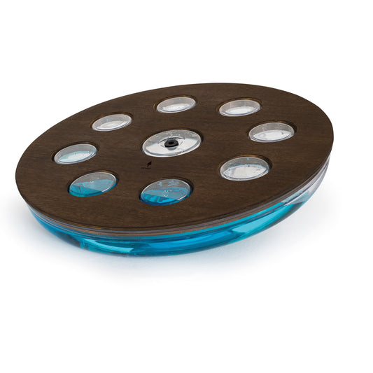 A balance board with natural walnut wood materials that incorporates a water-filled tank, for core stability training. NOHRD Eau-Me Board