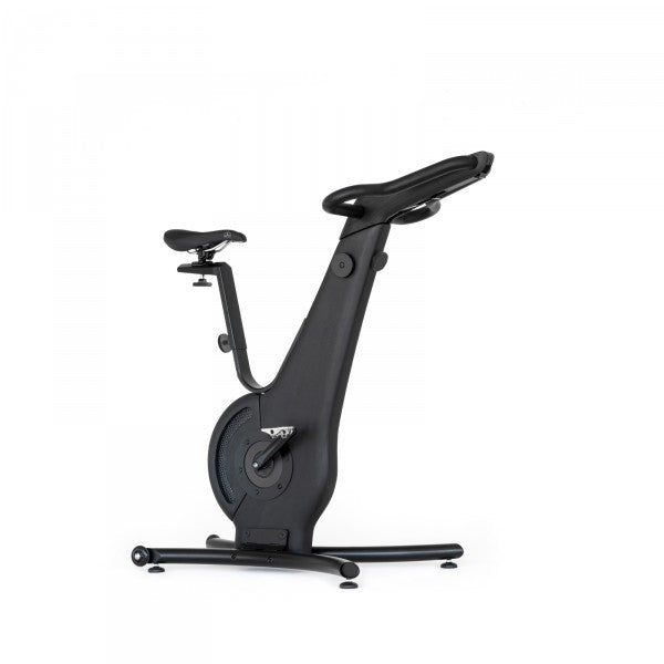 A modern exercise bike with a shadow black wooden frame and minimalist design, featuring an adjustable seat and streamlined structure. NOHRD Bike V2