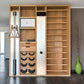 A luxurious gym equipment placed in a home gym, featuring cable machine, cross country ski trainer, four pairs of swing weights, wall bar, touchscreen tablet and shelving, all in walnut wood finish. NOHRD Wall - The Modular Solution