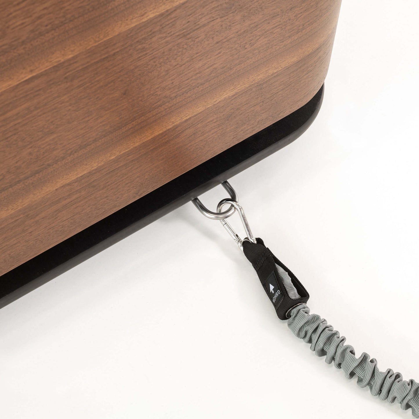 Luxury fitness equipment, details view of the resistance tubes from the Nohrd Stepbox - all in one fitness box made with natural walnut wood.